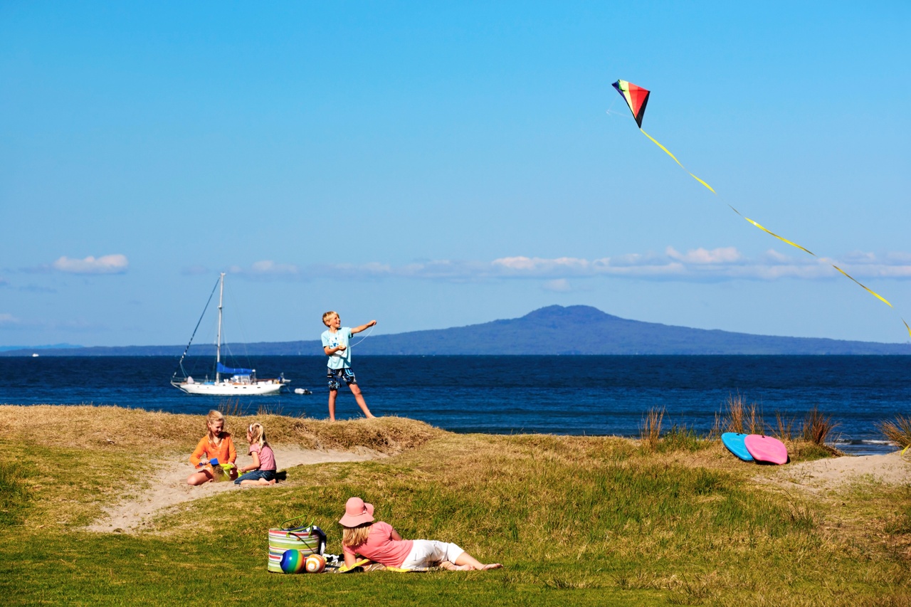 Family enjoying a day out at Shakespear Park in North Auckland