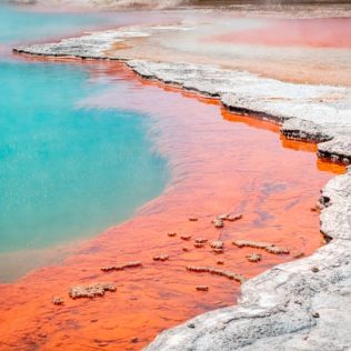 colourful geothermal lake in rotorua
