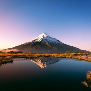 lake in front of mount taranaki