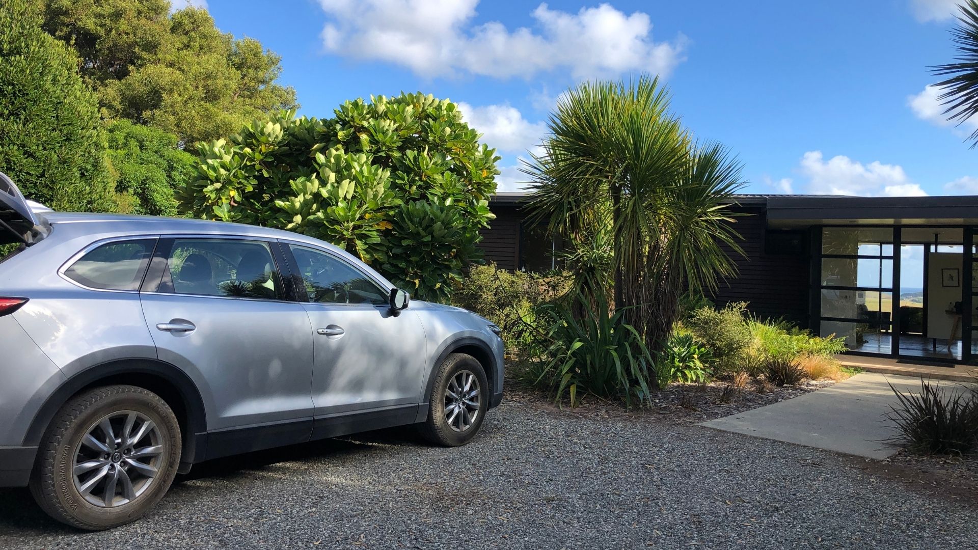 silver suv parked outside holiday home