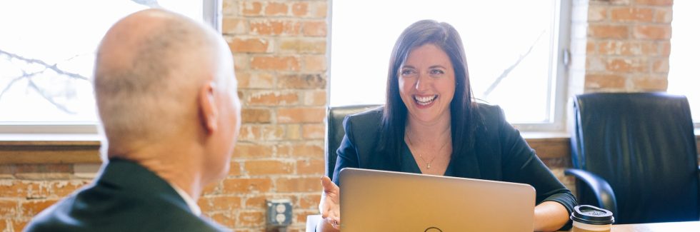 two business people sitting in office