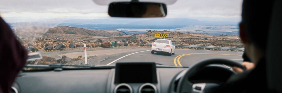 man driving car